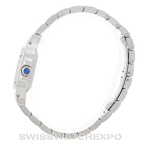This image shows a side profile of a Cartier Santos W20054D6 Women
s Stainless Steel Silver Dial W20054D6 Women
s Stainless Steel Silver Dial watch, highlighting its bracelet and crown with a blue gem.