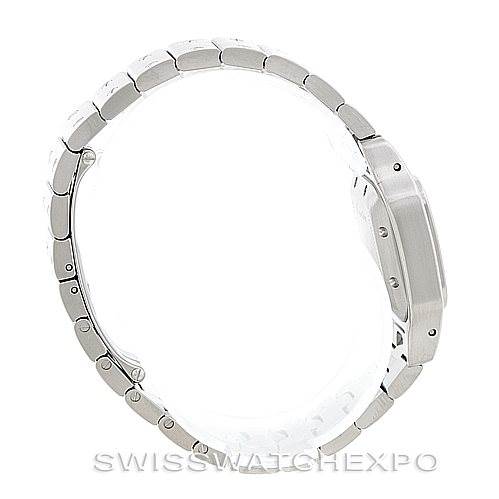 The image shows a side view of the Santos model by Cartier, highlighting its bracelet and case with a metallic finish.