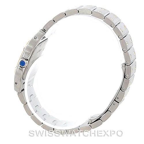 This image shows a side profile of the Cartier Santos W20012C4 Women's Stainless Steel Silver Dial W20012C4 Women's Stainless Steel Silver Dial watch, highlighting the bracelet and crown with a blue cabochon.