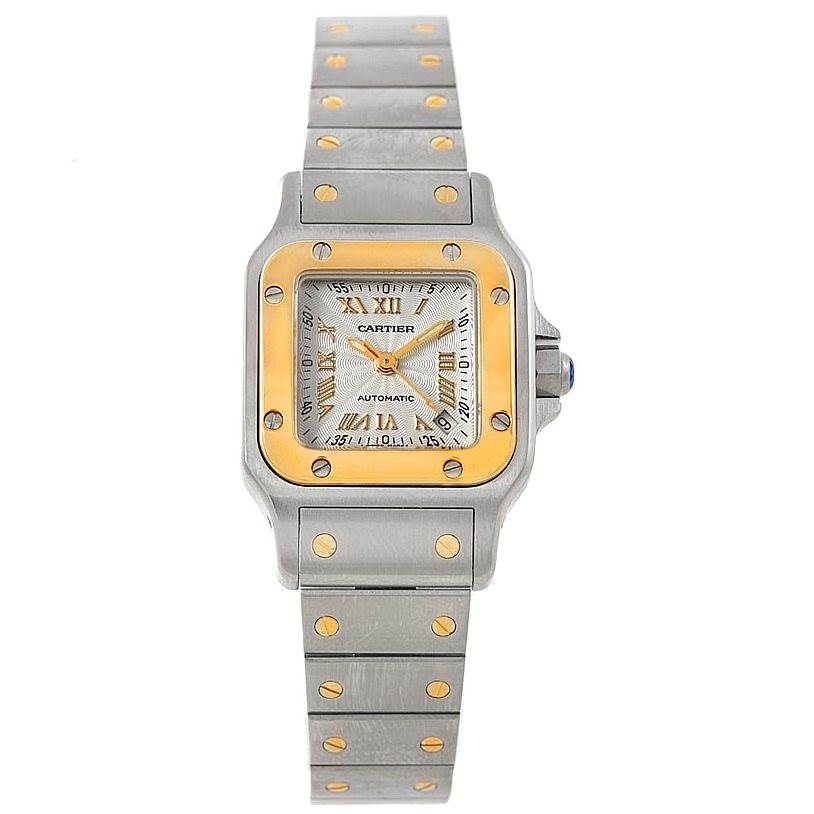 The image shows a frontal view of a Santos model watch by Cartier, showcasing the dial, bezel, and bracelet.