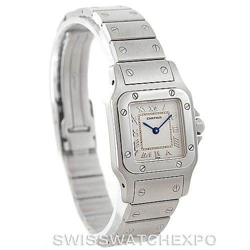 The image shows a Santos de Cartier watch, viewed from a slightly angled perspective, highlighting its face and bracelet.