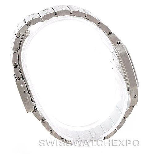 This image shows the side profile of a Cartier Santos Women
s Stainless Steel Silver Dial Women
s Stainless Steel Silver Dial watch, focusing on the bracelet and case thickness.