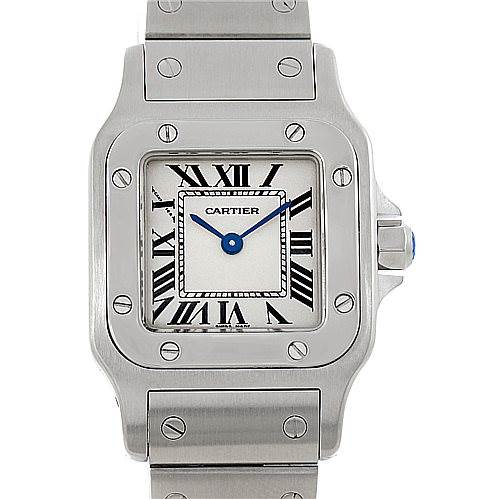 The image shows a front view of a Santos model watch by Cartier, featuring the dial, case, and part of the bracelet.