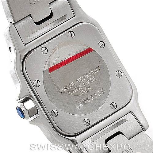 The image shows the back case of a Santos model watch by Cartier, displaying its water resistance and Swiss-made engraving.