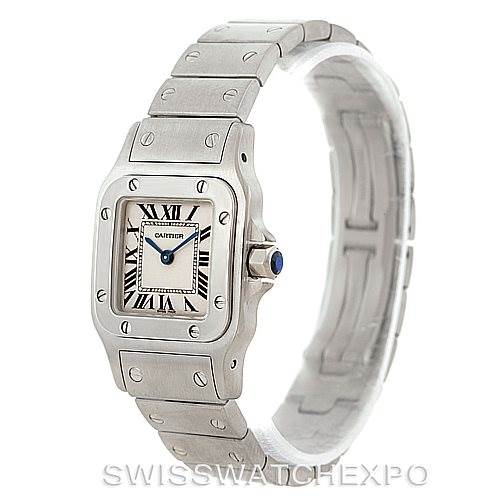 The Cartier Santos W20056D6 Women
s Stainless Steel Silver Dial W20056D6 Women
s Stainless Steel Silver Dial watch is shown at a three-quarter angle, highlighting the dial, bezel, and bracelet.