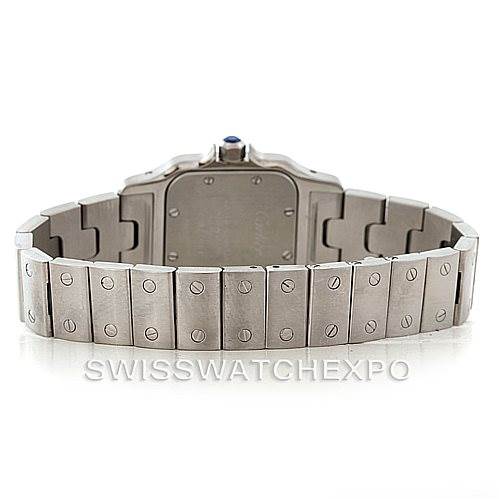 The image shows the back and bracelet of a Cartier Santos W20056D6 Women
s Stainless Steel Silver Dial W20056D6 Women
s Stainless Steel Silver Dial watch, highlighting its screw pattern and clasp area.