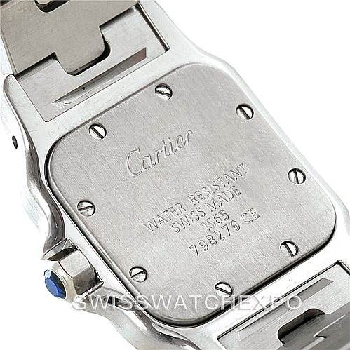The image shows the back case of a Cartier Santos W20056D6 Women
s Stainless Steel Silver Dial W20056D6 Women
s Stainless Steel Silver Dial watch, highlighting its screws, water resistance information, and bracelet attachment.