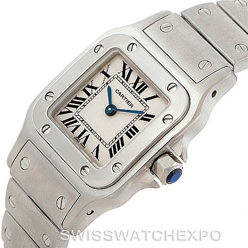 The image shows a close-up angled view of the Cartier Santos W20056D6 Women
s Stainless Steel Silver Dial W20056D6 Women
s Stainless Steel Silver Dial watch, highlighting its face, bezel, crown, and part of the bracelet.