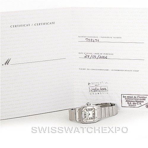 The image shows a Cartier Santos W20056D6 Women
s Stainless Steel Silver Dial W20056D6 Women
s Stainless Steel Silver Dial watch accompanied by its certificate of Best Quality
ity and purchase date documents.