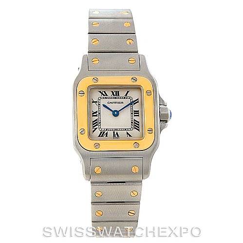 The Cartier Santos W20012C4 Women
s Stainless Steel Silver Dial W20012C4 Women
s Stainless Steel Silver Dial watch is shown from a top-down angle, displaying the dial, bezel, and bracelet.