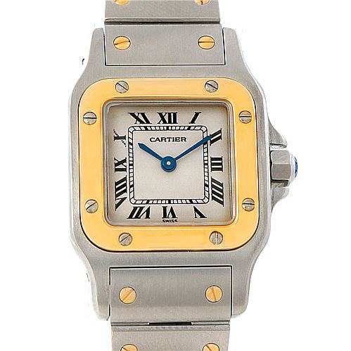 The image shows a front view of the Cartier Santos W20012C4 Women
s Stainless Steel Silver Dial W20012C4 Women
s Stainless Steel Silver Dial watch, focusing on its dial, bezel, and part of the bracelet.