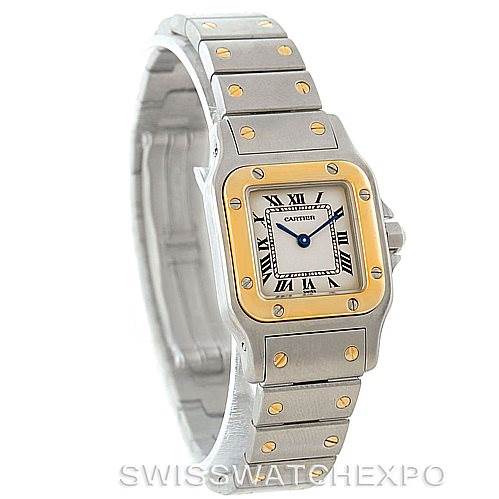 The image shows a Cartier Santos W20012C4 Women
s Stainless Steel Silver Dial W20012C4 Women
s Stainless Steel Silver Dial watch at a front-left angle, featuring its square face, bezel, and metal bracelet with gold accents.