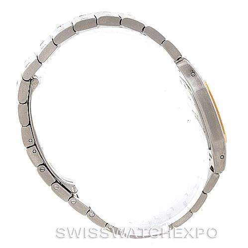 The image shows a side view of a Cartier Santos W20012C4 Women
s Stainless Steel Silver Dial W20012C4 Women
s Stainless Steel Silver Dial watch, focusing on the bracelet and the watch case
s thickness.