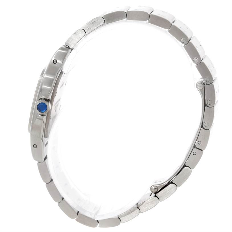 The image shows a side view of the band and crown of a Cartier Santos W20056D6 Women
s Stainless Steel Silver Dial W20056D6 Women
s Stainless Steel Silver Dial watch.