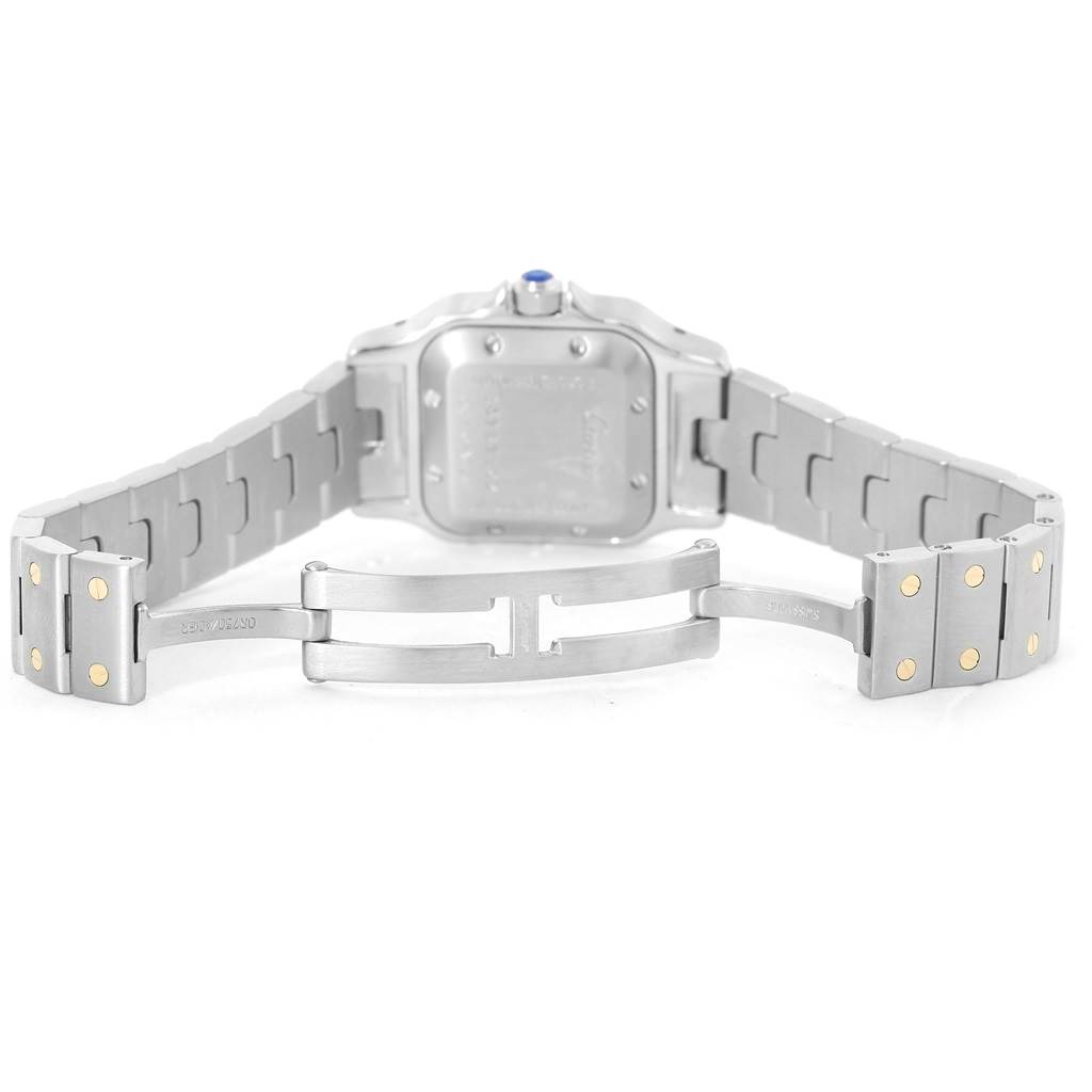 The image shows the back view of a Cartier Santos W20057C4 Women
s Stainless Steel Silver Dial W20057C4 Women
s Stainless Steel Silver Dial watch, focusing on the deployment clasp and stainless steel bracelet.