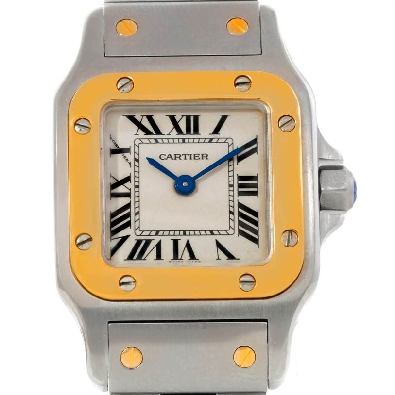 This image shows a front view of a Cartier Santos W20012C4 Women
s Stainless Steel Silver Dial W20012C4 Women
s Stainless Steel Silver Dial watch, highlighting its dial, bezel, and part of the bracelet.