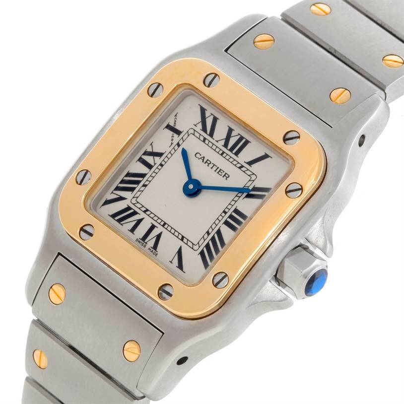 The image shows a close-up angled view of the Cartier Santos W20012C4 Women's Stainless Steel Silver Dial W20012C4 Women's Stainless Steel Silver Dial watch highlighting its dial, bezel, and part of the bracelet.