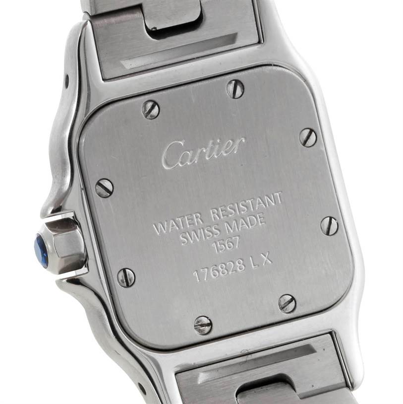 This image shows the back case and part of the wristband of a Santos model by Cartier.