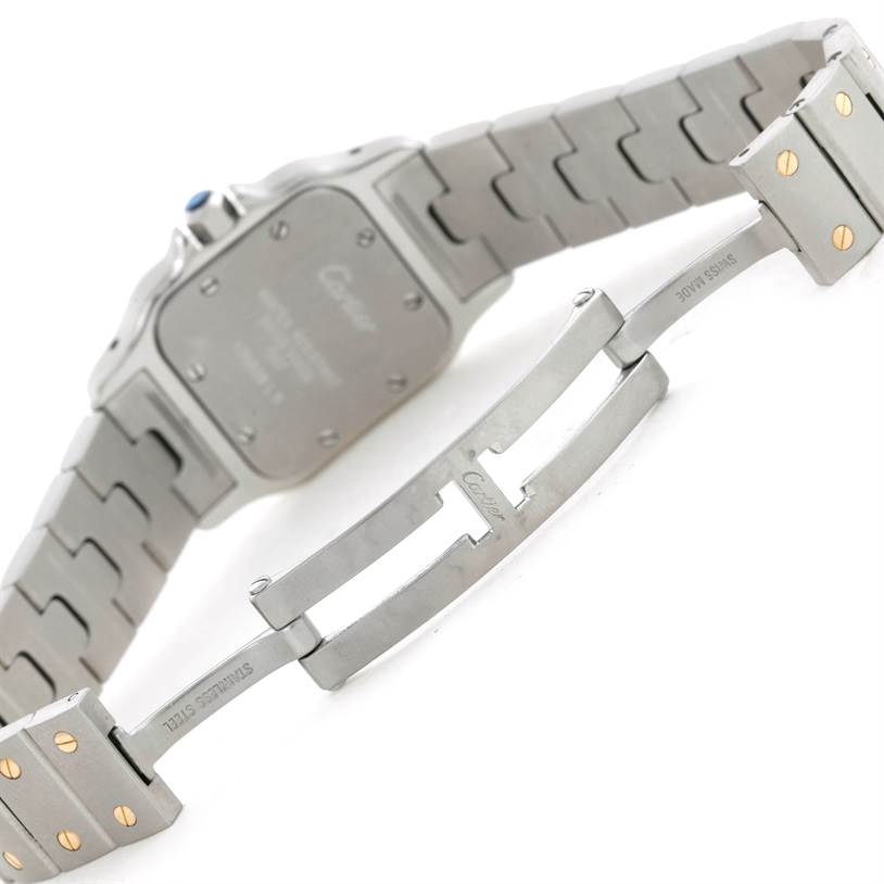 The image shows the backside and clasp mechanism of a Santos model by Cartier watch.