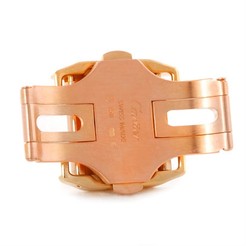 The image shows a close-up of the clasp mechanism of a Cartier Santos WM502051 Yellow Gold Silver Dial WM502051 Yellow Gold Silver Dial watch in rose gold.