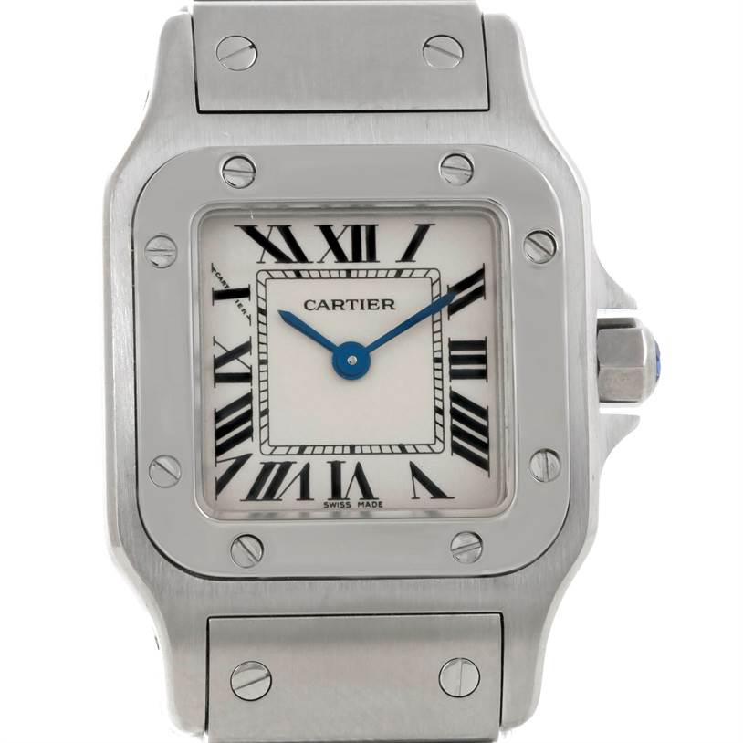 The image shows a front view of the Cartier Santos W20056D6 Women
s Stainless Steel Silver Dial W20056D6 Women
s Stainless Steel Silver Dial watch, highlighting its white dial, blue hands, and stainless steel case.