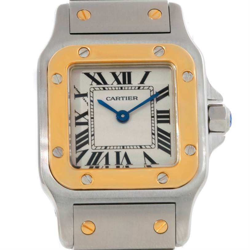 The image shows a close-up of the Cartier Santos W20012C4 Women
s Stainless Steel Silver Dial W20012C4 Women
s Stainless Steel Silver Dial watch, focusing on the dial and part of the bracelet.