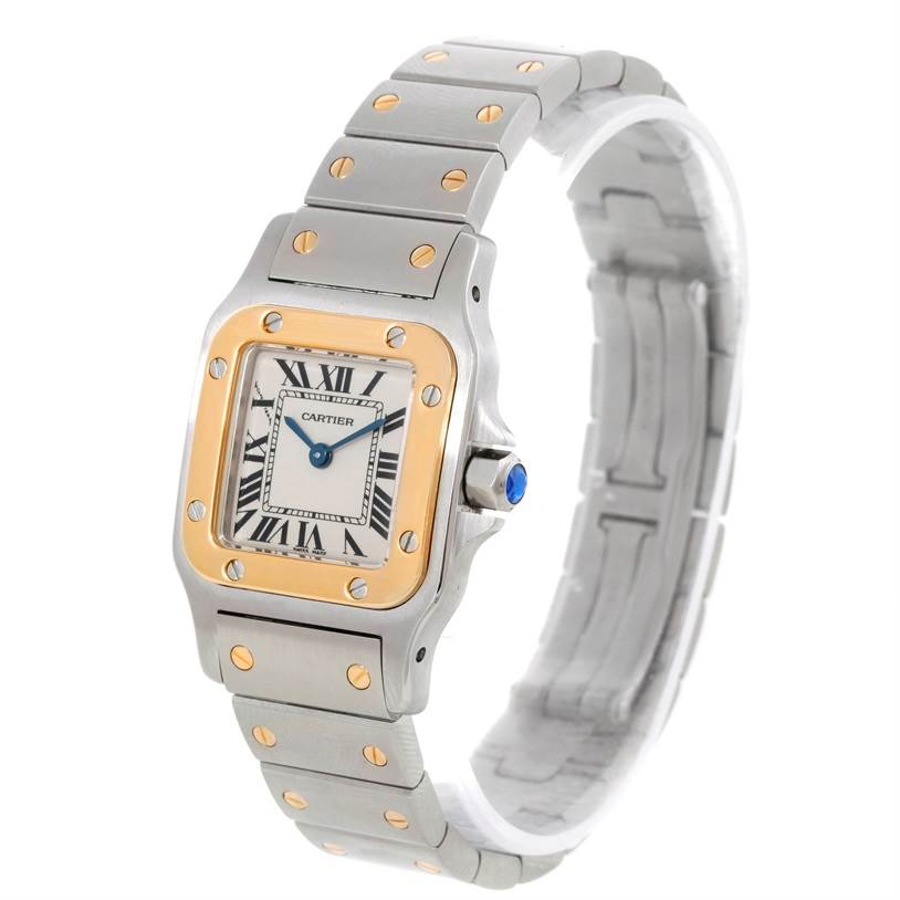 The image shows a Cartier Santos W20012C4 Women
s Stainless Steel Silver Dial W20012C4 Women
s Stainless Steel Silver Dial watch at a three-quarter angle, highlighting the face, bezel, and part of the bracelet.