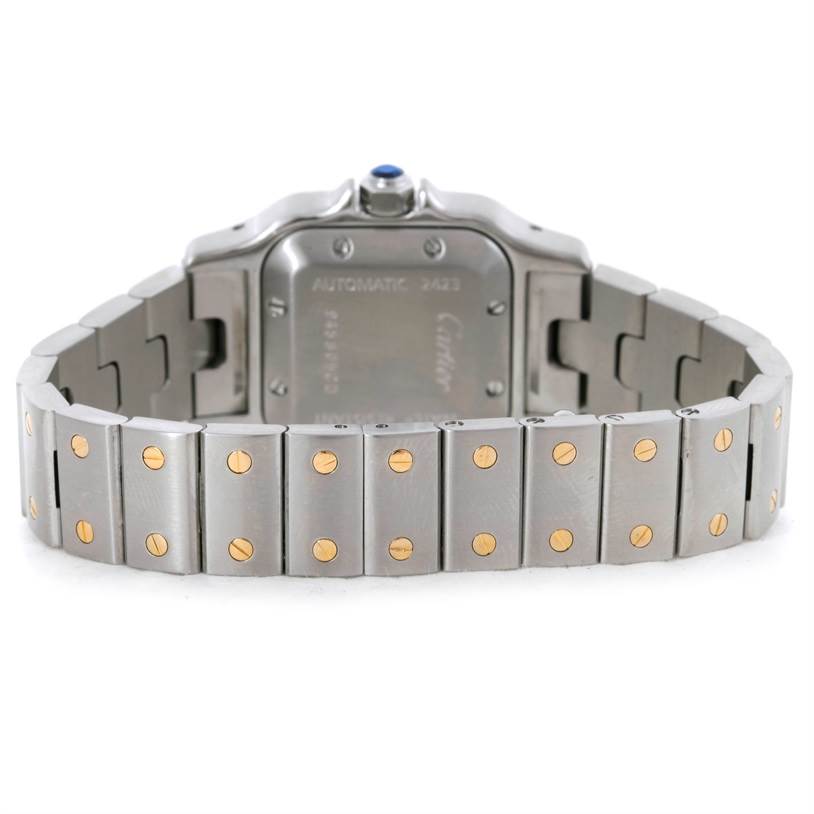 The image shows the back view of a Cartier Santos W20057C4 Women
s Stainless Steel Silver Dial W20057C4 Women
s Stainless Steel Silver Dial watch, highlighting its band and case back.