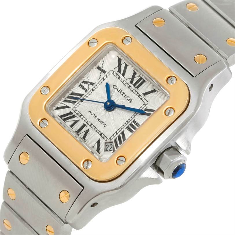 The image displays a close-up angle of a Cartier Santos W20057C4 Women
s Stainless Steel Silver Dial W20057C4 Women
s Stainless Steel Silver Dial watch, focusing on the face, bezel, and part of the bracelet.