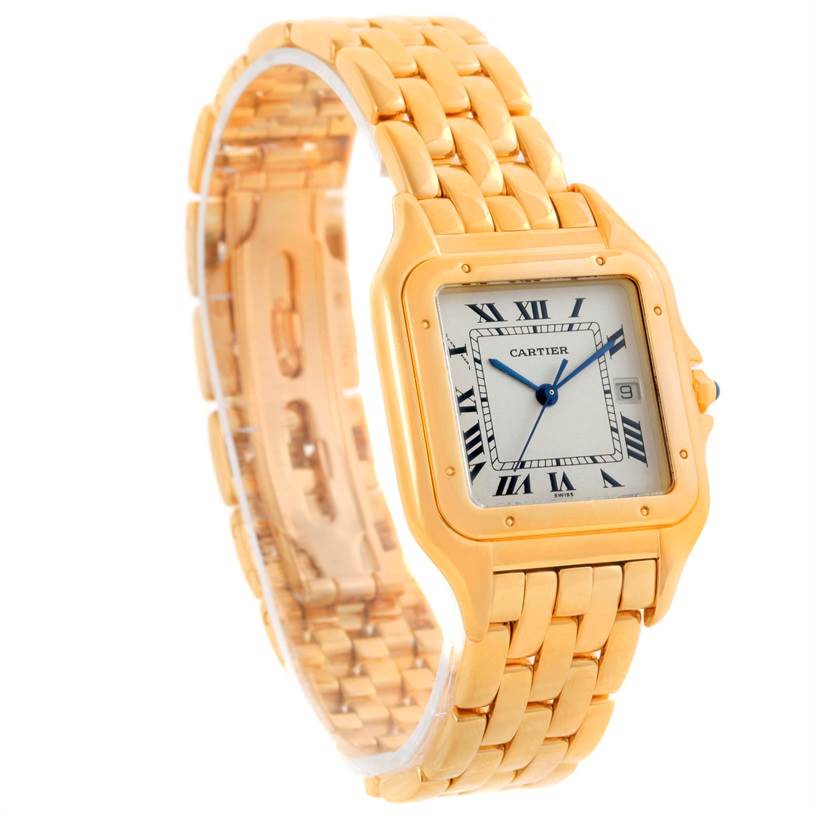 The Cartier Panthere W25014B9 Yellow Gold Silver Dial W25014B9 Yellow Gold Silver Dial watch is shown at a slight angle, displaying its gold bracelet, square face, Roman numeral dial, and date window.