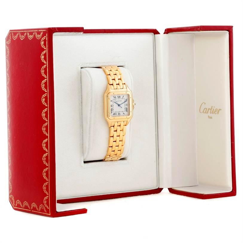 The image shows a Cartier Panthere W25014B9 Yellow Gold Silver Dial W25014B9 Yellow Gold Silver Dial watch placed inside an open red and white box.