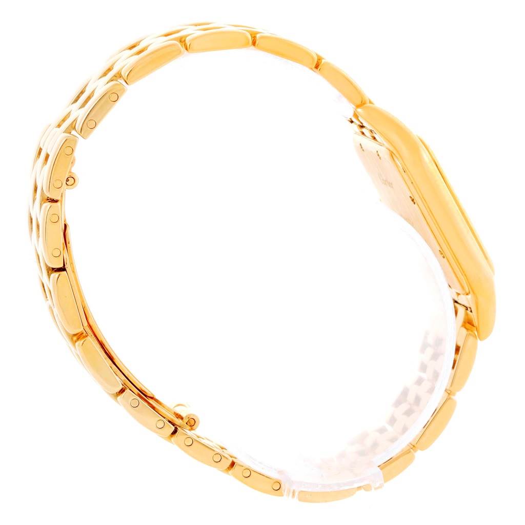 The image shows a side view of a Cartier Panthere W25014B9 Men's Yellow Gold Silver Dial W25014B9 Men's Yellow Gold Silver Dial model watch, highlighting its gold bracelet and case.