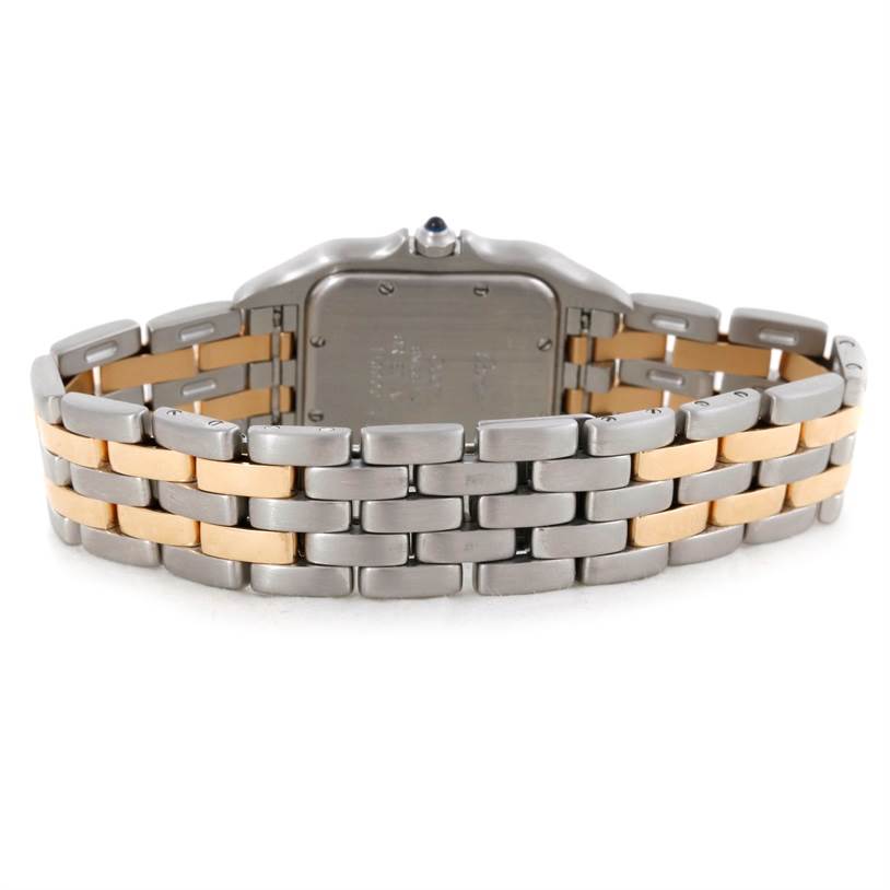 The image shows the back of the Panthere model by Cartier, highlighting its stainless steel and gold bracelet.