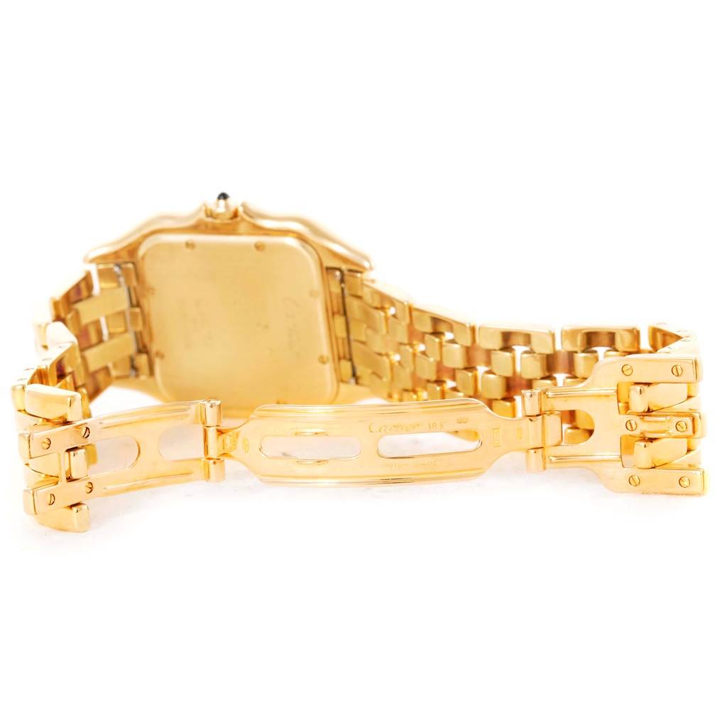 The image shows the back and inside clasp of the Cartier Panthere W25014B9 Men's Yellow Gold Silver Dial W25014B9 Men's Yellow Gold Silver Dial watch, highlighting its gold case and bracelet.