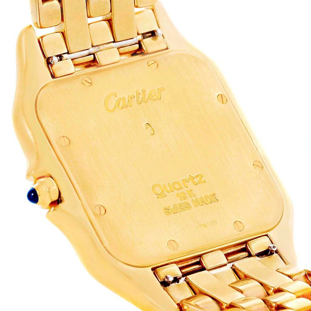 This image shows the back case and part of the metal bracelet of a Cartier Panthere W25014B9 Men's Yellow Gold Silver Dial W25014B9 Men's Yellow Gold Silver Dial model watch at an angled view.