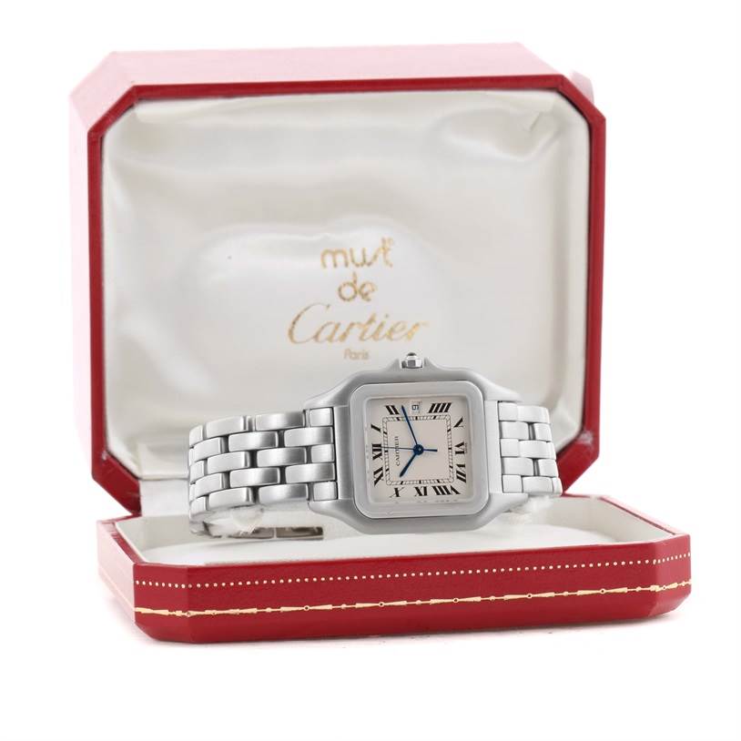 The Panthere model by Cartier is shown from the front, displaying its face and metal band inside an open Cartier box.