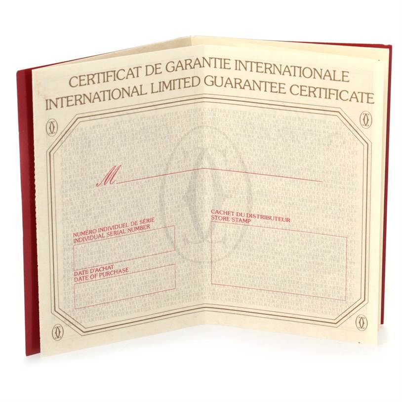 This image shows the opened international guarantee certificate for the Cartier Panthere W25014B9 Yellow Gold Silver Dial W25014B9 Yellow Gold Silver Dial model watch.