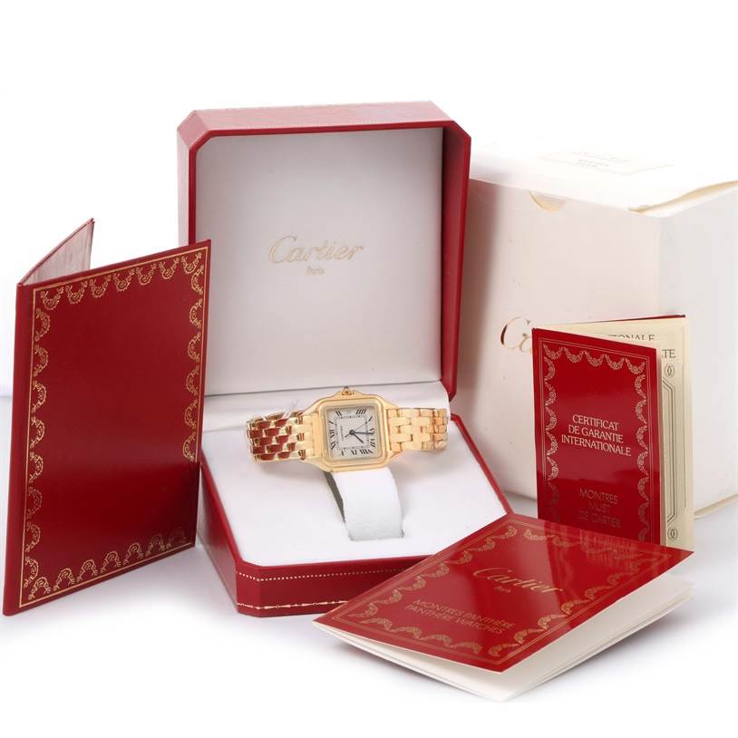 The image shows a Cartier Panthere W25014B9 Yellow Gold Silver Dial W25014B9 Yellow Gold Silver Dial watch in its box, accompanied by warranty certificates and documentation from a front angle.