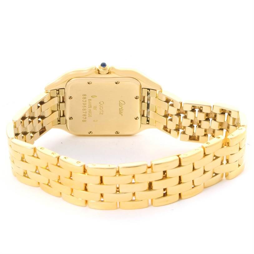 The image shows the backside of the Cartier Panthere W25014B9 Yellow Gold Silver Dial W25014B9 Yellow Gold Silver Dial model watch, highlighting its gold bracelet and case back.