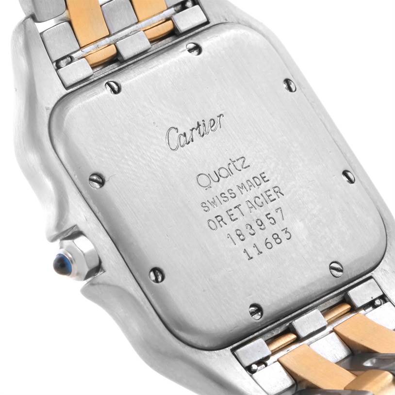 This image shows the case back and part of the metal bracelet of a Cartier Panthere Men
s Steel and Gold (two tone) Silver Dial Men
s Steel and Gold (two tone) Silver Dial watch.