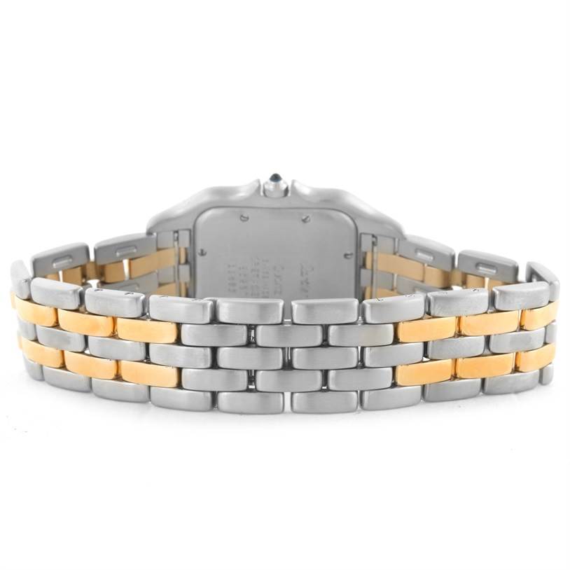 The image shows the back view of the Panthere model watch by Cartier, highlighting its two-tone metal bracelet and case back.