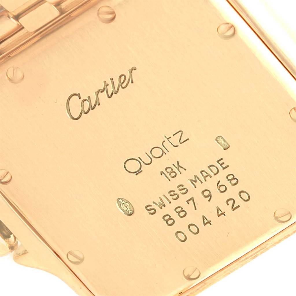 This image shows the back case of the Panthere model by Cartier, displaying details like brand name, movement type, and serial numbers.