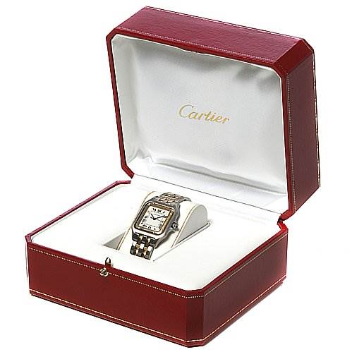 The Panthere model by Cartier is shown from a front angle, displayed inside its open red and white box.
