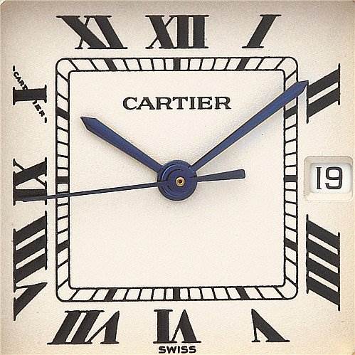 This image shows a close-up of the dial of a Cartier Panthère watch, featuring Roman numerals and a date window at 3 o'clock.