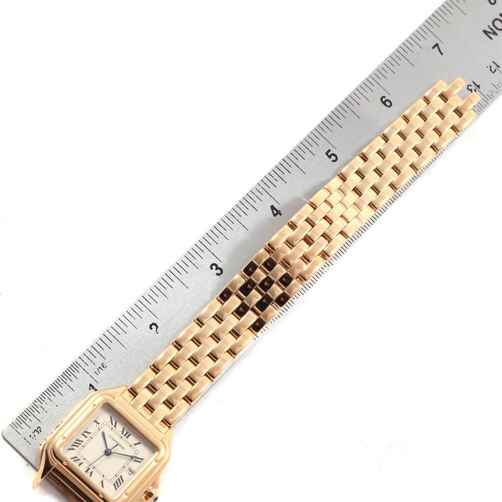 The image shows a Cartier Panthere W25014B9 Men's Yellow Gold Beige Dial W25014B9 Men's Yellow Gold Beige Dial watch laid flat with the strap extended next to a ruler for measurement.