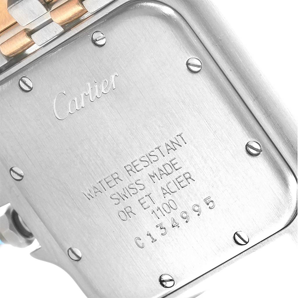 The image shows the back of a Cartier Panthere W25028B8 Steel and Gold (two tone) Silver Dial W25028B8 Steel and Gold (two tone) Silver Dial watch, highlighting its water resistance, Swiss make, and serial number.