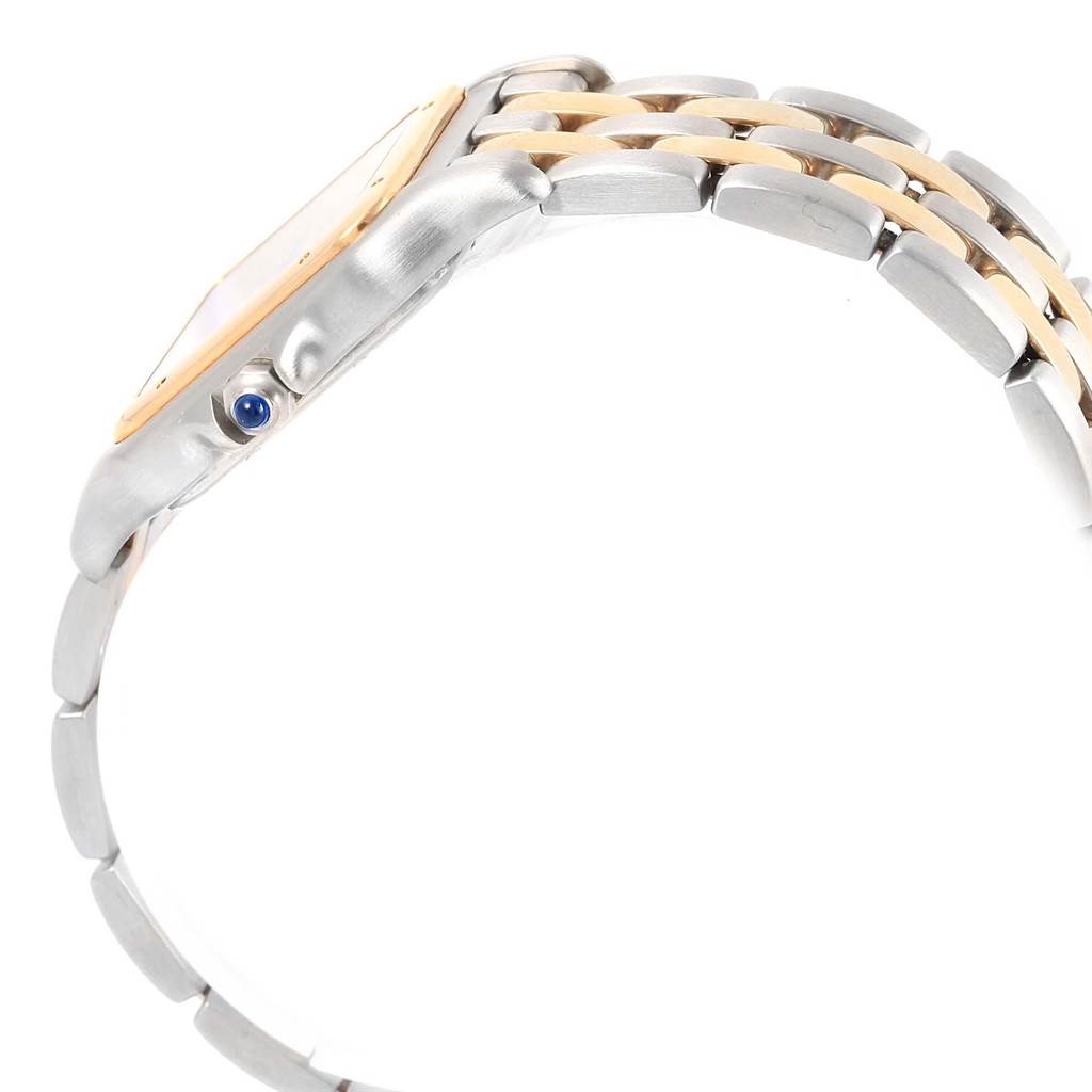 The image shows a side profile of the Cartier Panthere W25028B8 Steel and Gold (two tone) Silver Dial W25028B8 Steel and Gold (two tone) Silver Dial watch, highlighting the bracelet and the crown with a blue cabochon.