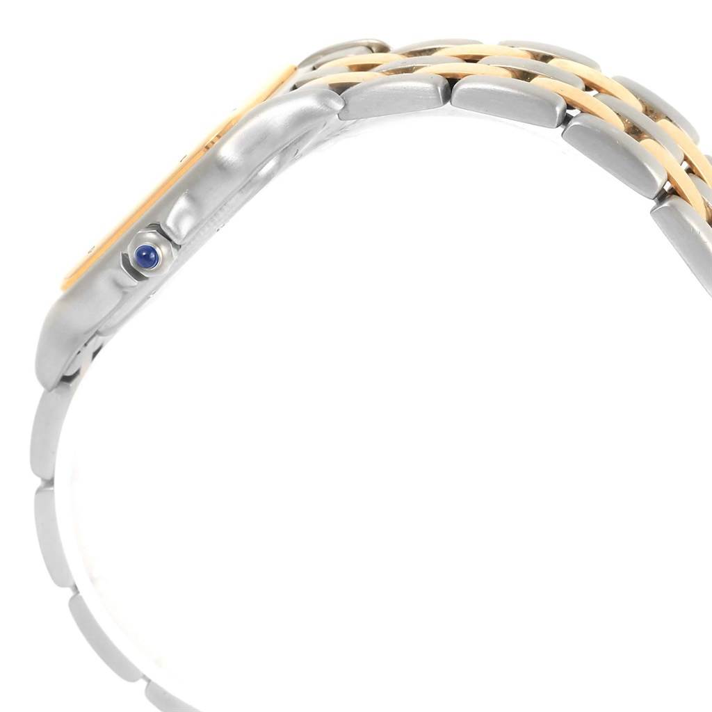 The image shows a side view of the Panthère de Cartier watch, highlighting its metal bracelet and crown with a blue cabochon.