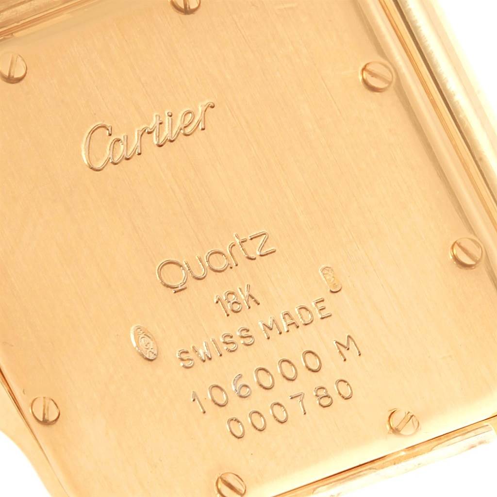 The image shows a close-up of the back case of a Cartier Panthere W25014B9 Men's Yellow Gold Silver Dial W25014B9 Men's Yellow Gold Silver Dial watch, displaying the brand name and specifications.