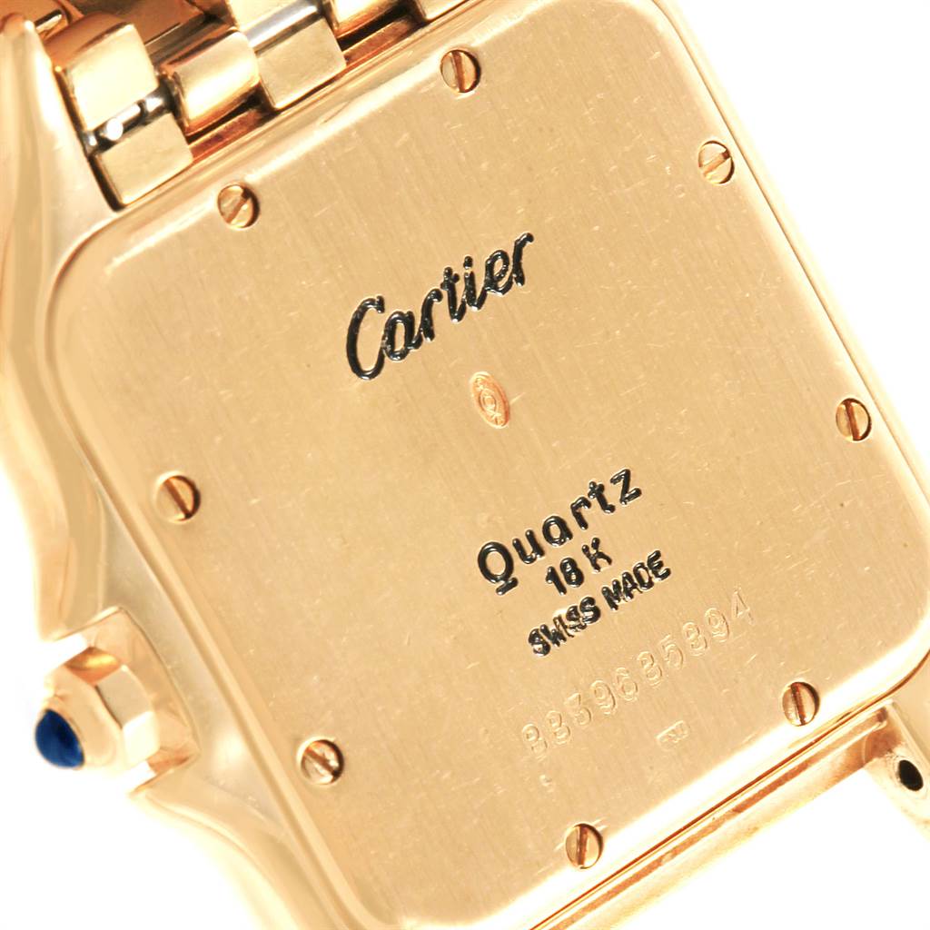 The image shows the back casing of a Panthere model Cartier watch, highlighting the brand engraving and specifications.